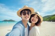 © Usablestores - Asian Couple's Beach Selfie