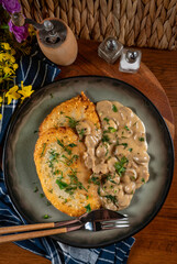 Wall Mural - Crispy potato pancakes with mushroom sauce