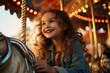kids having fun on amusement park merry-go-round ride Young girl riding a carousel outside in festive festival carnival fun joyful exited face expression