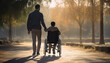 Father with son in wheelchair walking in park in autumn