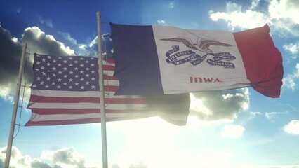 Wall Mural - The Iowa state flags waving along with the national flag of the United States of America. In the background there is a clear sky