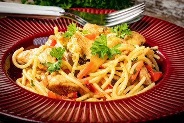 Wall Mural - Fried noodles with chicken and vegetables.