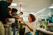 © Zamrznuti tonovi - A happy businesswoman is having birthday surprise party at office.