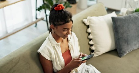 Canvas Print - Woman, phone and typing with communication on sofa for conversation, chat or email in living room of home. Indian, person and smartphone from above for texting with internet or technology in lounge