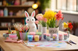 A table with a variety of Easter-themed craft supplies for a family crafting session.