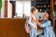 © lordn - Child going back to school. Mother and kid getting ready for first school day. Little girl and mom going to school
