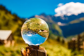 Wall Mural - Crystal ball alpine landscape shot at Mount Stubnerkogl, Bad Gastein, St. Johann im Pongau, Salzburg, Austria