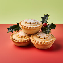 Three Christmas Mince Pies With Holly