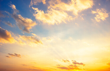Wall Mural - cloudy sky and bright sunrise over the horizon.