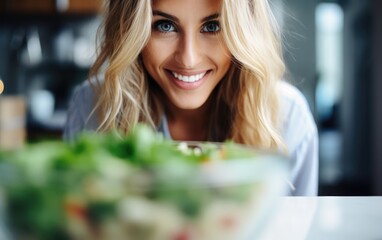 Wall Mural - A young woman eating behind kitchen table