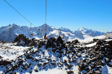 Wall Mural - Cable car stations on Mount Elbrus with blue sky, Russia.