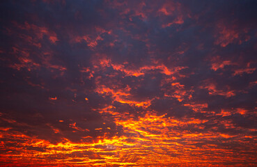 Wall Mural - Beautiful sunrise in the sky with clouds. Sky background. Nature.