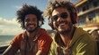 Two ethnic young man listening music using headphones toothy smiling sitting at embankment of ocean being in great mood relaxing. Leisure. Friendship.