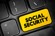 Social Security text button on keyboard, concept background