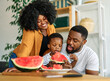 © Lumos sp - child family kitchen food boy son father mother watermelon fruit slice summer organic meal fun preparing healthy diet eating home black