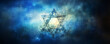 Decorative bright glowing Jewish religion symbol Magen David star on blue bokeh blurred background. Rosh Hashanah, Jewish New Year holiday or Hannukah greeting card with lights and Jewish star