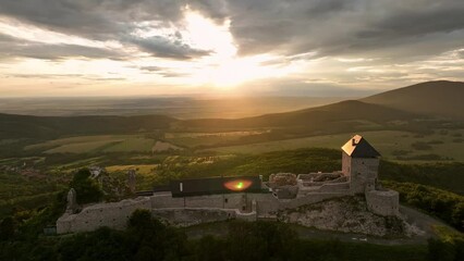 Wall Mural - Aerial view of Regec Castle in Hungary - sunset
