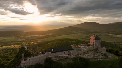 Wall Mural - Aerial view of Regec Castle in Hungary - sunset
