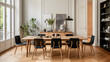Une salle à manger avec une table en bois dans un appartement à Paris. Au sol, un parquet en chevron. 