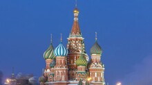Timelapse Capturing The Transition From Winter Day To Night At Red Square In Moscow, Russia, With The Illuminated Cathedral Of St. Basil.