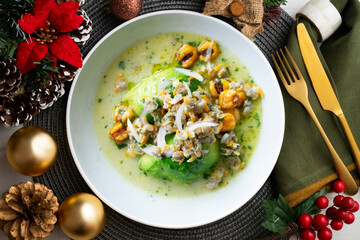 Poster - Ceviche with cockles and avocado. Christmas food served on a table decorated with Christmas motifs.