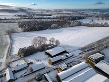 Winter Landscape - Aerial View Of A Snow Covered Agricultural Landscape In North Yorkshire In The United Kingdom.