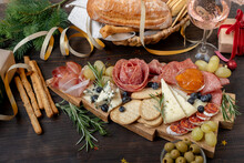 Party Charcuterie Board Italian Food Antipasti Prosciutto Ham, Salami And Cheese Appetizers Served In The Shape Of A Christmas Tree. Party Food For New Year's Eve, Christmas Or Birthday