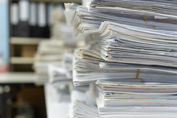 Wall Mural - Stack of old paper or documents on the table in office waits to management.