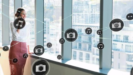 Poster - Animation of network of connections with icons over caucasian businesswoman in office