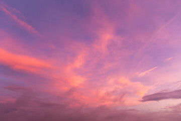 Wall Mural - Epic Dramatic soft sunrise, sunset pink purple violet orange sky with cirrus clouds in sunlight background texture