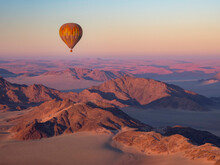 Early Morning Balloon Ride Over The Sand And Mountains In Namib-Naukluft Park; Sossusvlei, Namibia
