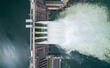© Evgenii Bakhchev - Aerial top down view of water discharge at hydroelectric power plant