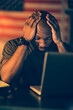 © Marko Geber - Stressed Military Man with Laptop at American Flag Background
