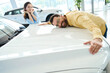 © Svitlana - Photo of loving couple in car center