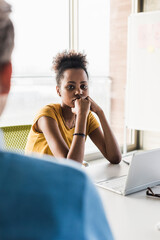 Young woman in a business meeting