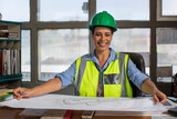 Fototapeta  - Female worker sitting in site office of quarry