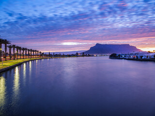 Wall Mural - Woodbridge Island lagoon, houses and the table mountain in the background, Cape Town, South Africa