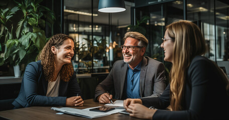 Wall Mural - Group of happy colleagues together in the office, happy cooperation with clients, business cooperation, work meeting, brainstorming