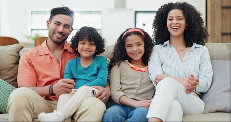 Poster - Love, smile and face of parents and kids on a sofa for bonding and relaxing together at home. Happy family, care and young Indian mother and father with children in the living room of modern house.