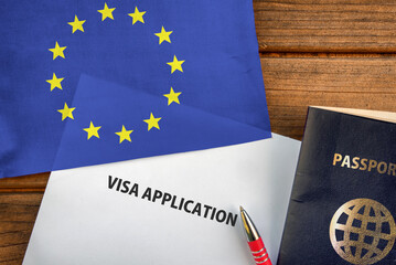 Visa application form, passport and flag of European Union