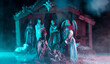 A Christmas nativity scene with baby Jesus, Mary and Joseph in the manger. Bethlehem. Christian religious. The Blessed Virgin Mary, Saint Joseph and baby Jesus. Selective focus.