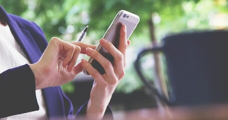 Poster - Animation of fingerprint over caucasian businesswoman using smartphone