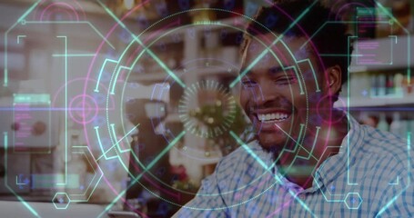 Poster - Animation of data processing over smiling african american man in cafe