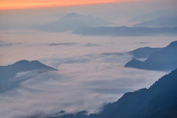 Fog in early morning over the mountain at Phu Chi Fah in Thailand