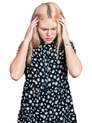 Poster - Young caucasian woman together with hand on head for pain in head because stress. suffering migraine.