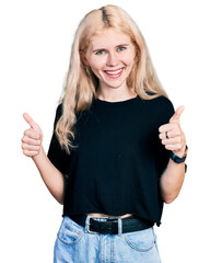 Poster - Young caucasian woman wearing casual clothes success sign doing positive gesture with hand, thumbs up smiling and happy. cheerful expression and winner gesture.