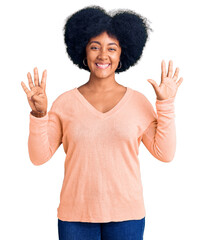 Sticker - Young african american girl wearing casual clothes showing and pointing up with fingers number nine while smiling confident and happy.