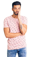 Sticker - Young handsome hispanic man wearing casual clothes thinking looking tired and bored with depression problems with crossed arms.