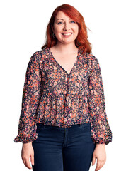 Poster - Young beautiful redhead woman wearing casual t-shirt with a happy and cool smile on face. lucky person.