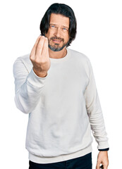 Sticker - Middle age caucasian man wearing casual clothes doing italian gesture with hand and fingers confident expression